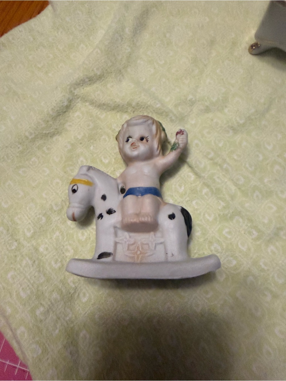 White and Blue Ceramic Rocking Horse Figurine with Child